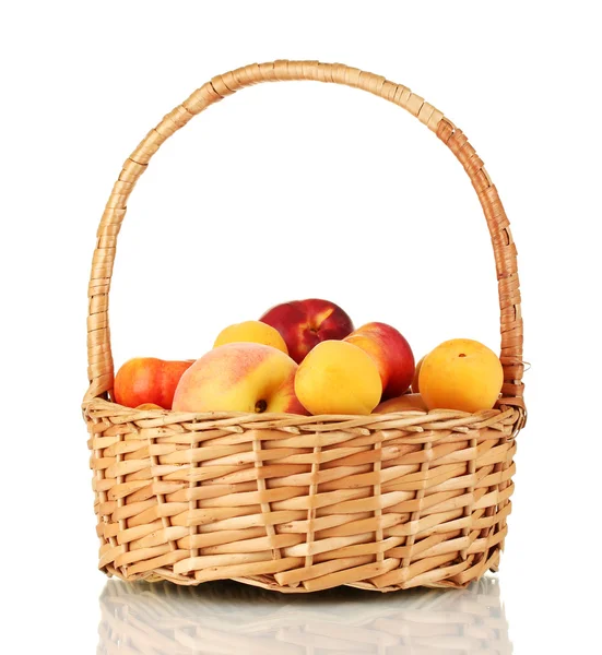 Ripe fruit in basket isolated on white — Stock Photo, Image