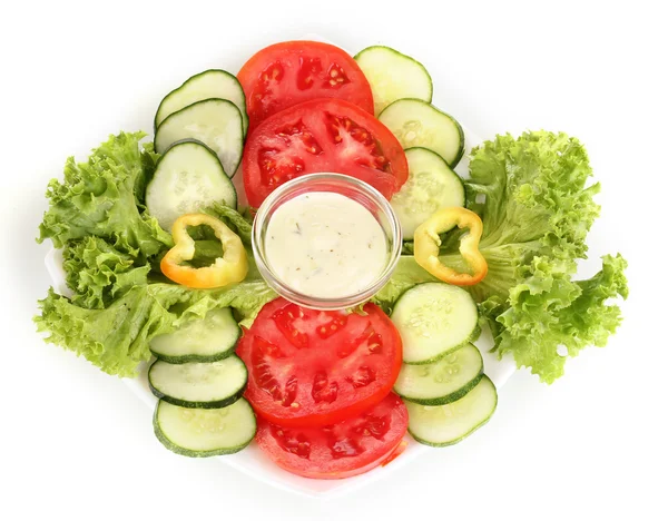 Chopped vegetables and sauce on plate isolated on white — Stok fotoğraf