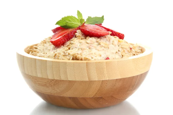 Tasty oatmeal with strawberries, isolated on white — Stock Photo, Image