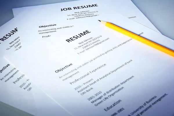 Closeup of resume with pencil on blue background — Stock Photo, Image