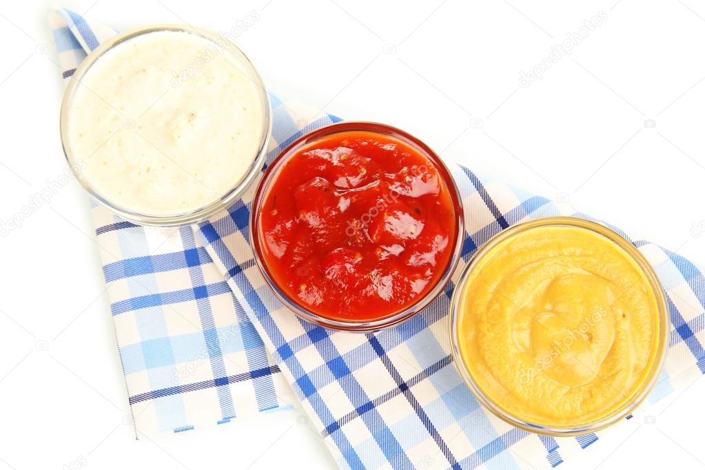 various sauces isolated on white
