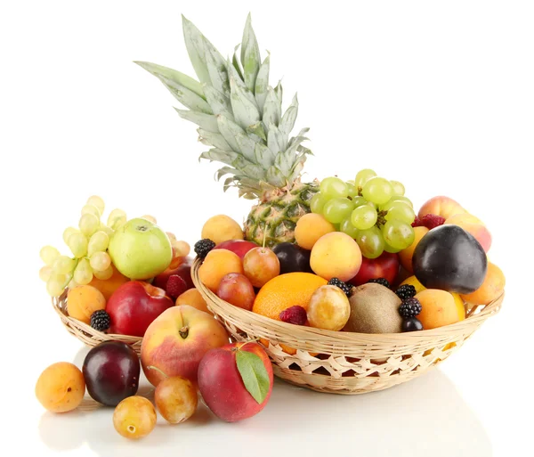 Still life of fruit in basket isolated on white — Stock Photo, Image