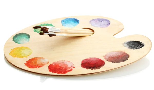 Holzkunstpalette mit Farbe und Pinsel isoliert auf Weiß — Stockfoto