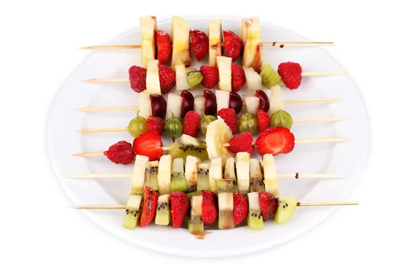 Mixed fruits and berries on skewers isolated on white — Stock Photo, Image