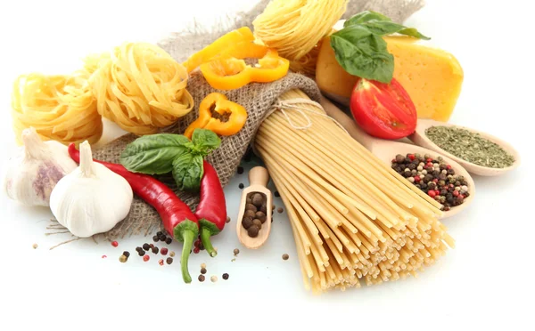 Pasta spaghetti, vegetables and spices, isolated on white — Stock Photo, Image