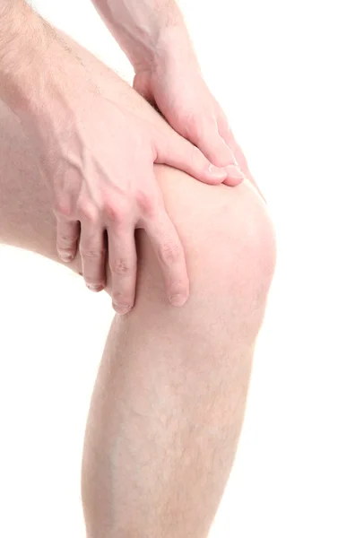 Hombre sosteniendo dolor de rodilla, aislado en blanco — Foto de Stock