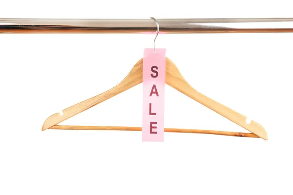 Wooden clothes hanger as sale symbol isolated on white — Stock Photo, Image