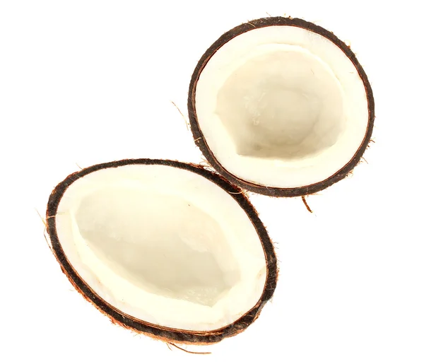 Mitades de coco aisladas sobre fondo blanco de cerca — Foto de Stock