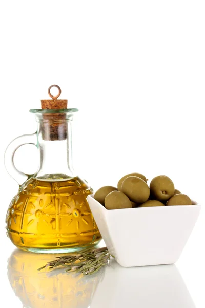 Green olives in white bowl with rosemary and olive oil isolated on white — Stock Photo, Image