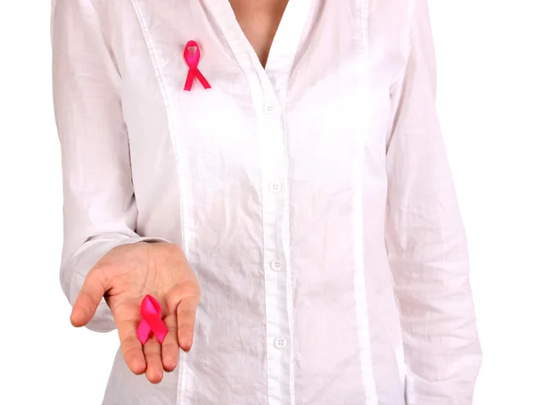 Frau mit rosa Schleife in den Händen isoliert auf weiß — Stockfoto