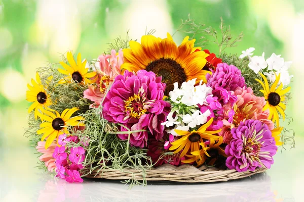 Beautiful bouquet of bright flowers on nature background — Stock Photo, Image