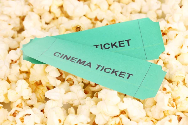 Cinema tickets on popcorn background — Stock Photo, Image