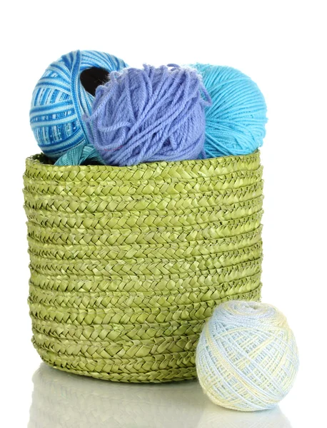 Colorful yarn for knitting in green basket isolated on white — Stock Photo, Image