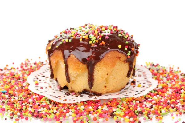 Appetizing chocolate cupcake close-up isolated on white — Stock Photo, Image