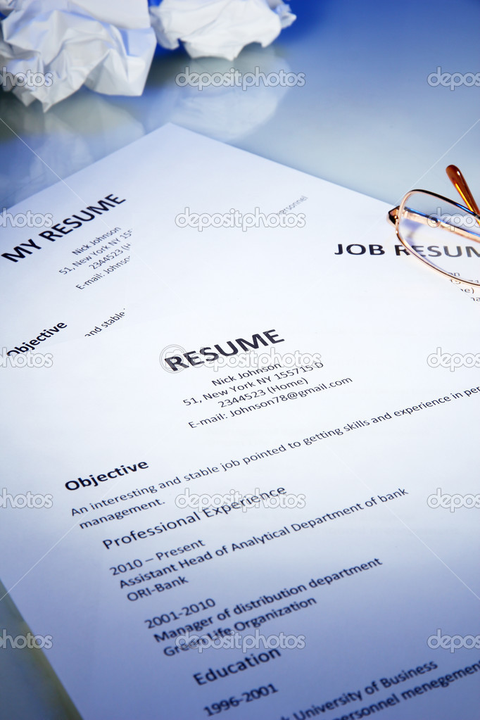 Closeup Of Resume With Glasses On Blue Background Royalty Free Photo Stock Image By C Belchonock 12859411