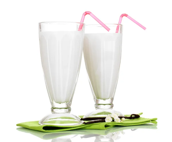 Vanilya süt sallar üzerinde beyaz izole — Stok fotoğraf