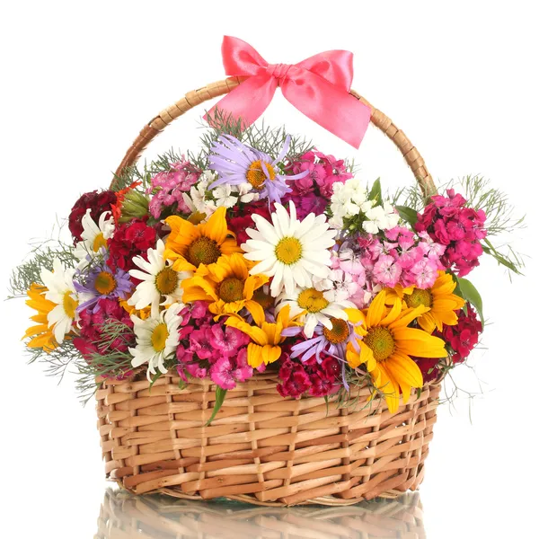 Beautiful bouquet of bright wildflowers in basket, isolated on white — Stock Photo, Image