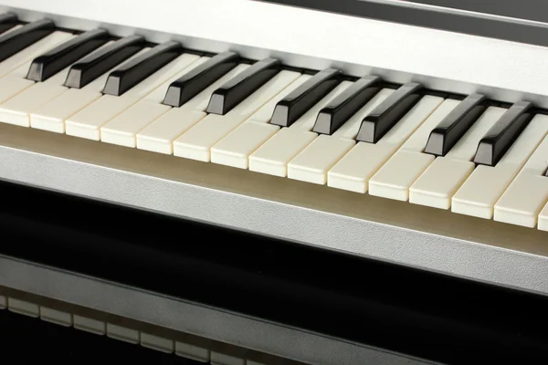 Sfondo della tastiera del pianoforte, primo piano — Foto Stock