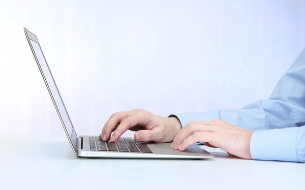 Closeup of businessman hands typing on laptop computer — Stock Photo, Image