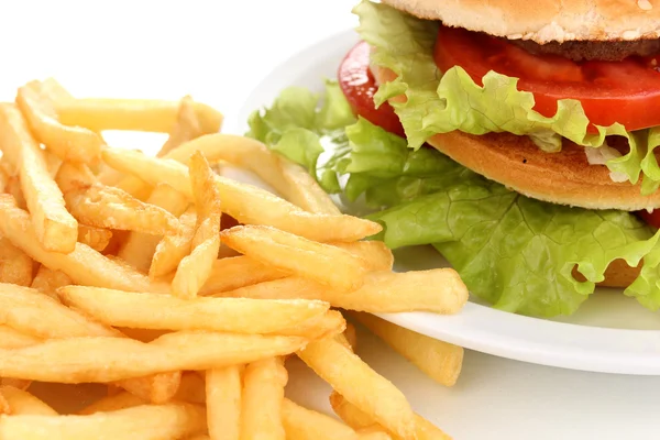 Big and tasty hamburger on plate and fried potatoes close-up isolated on wh — Stock Photo, Image