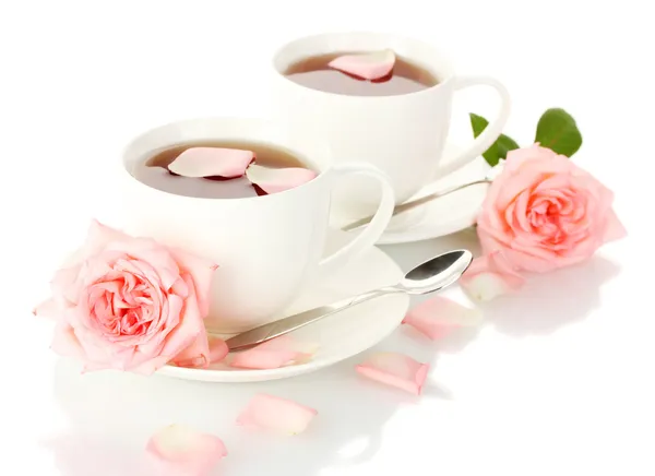 Cups of tea with roses isolated on white — Stock Photo, Image