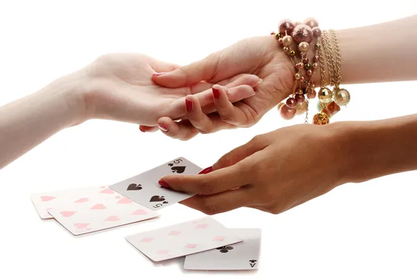 Leyendo las líneas de mano en las manos de una mujer aislada en blanco — Foto de Stock