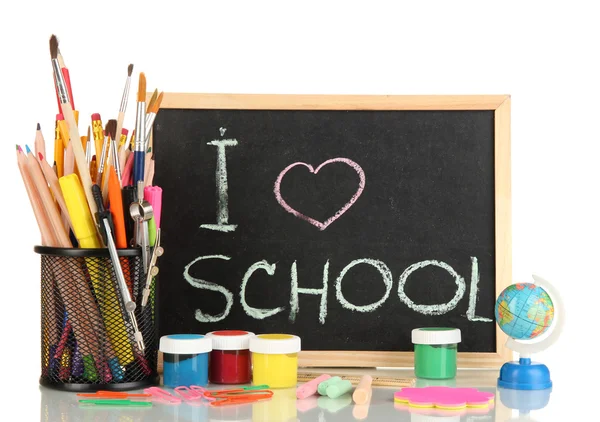 Mesa de escola pequena com vários materiais escolares close-up isolado em branco — Fotografia de Stock