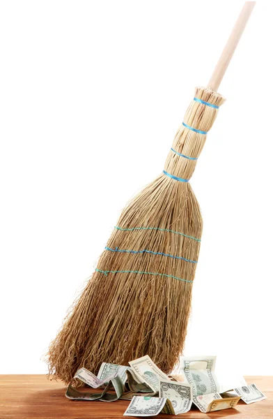 Broom sweep the dollars on white background — Stock Photo, Image