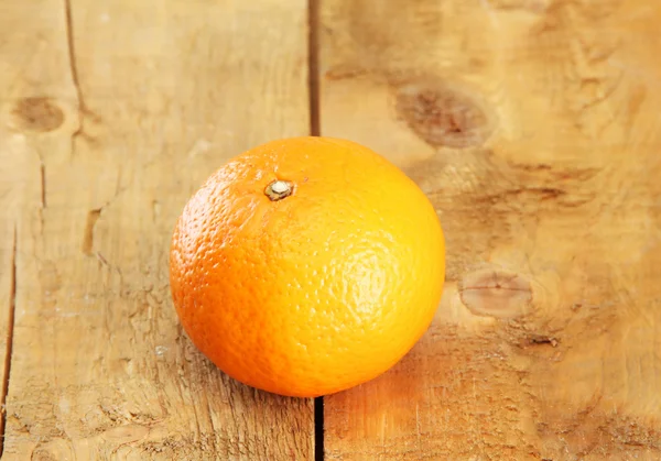 Zralé mandarinky na dřevěné pozadí — Stock fotografie