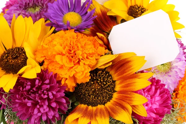 Beautiful bouquet of bright flowers with paper note close-up isolated on wh — Stock Photo, Image