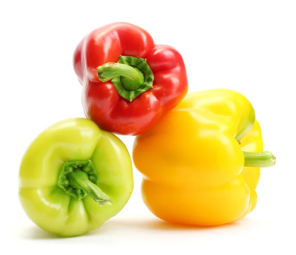 Fresh yellow, red and green bell peppers isolated on white — Stock Photo, Image