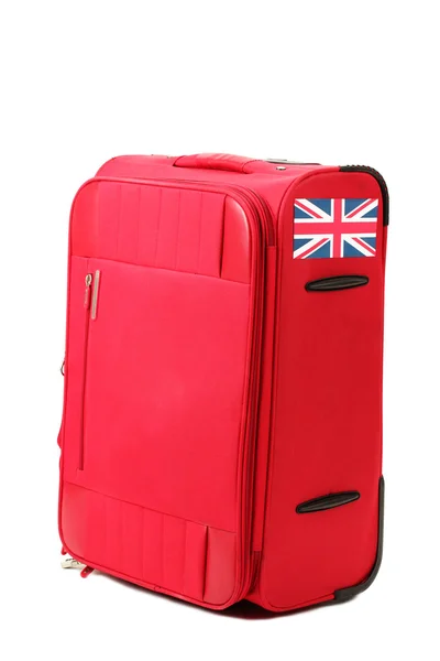 Red suitcase with sticker with flag of United Kingdom isolated on white — Stock Photo, Image