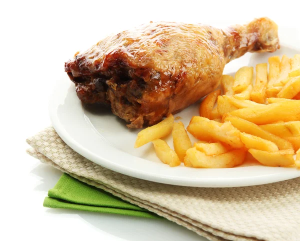 Roast chicken with french fries on plate, isolated on white — Stock Photo, Image