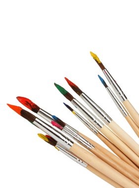 Paint brushes with gouache isolated on white clipart