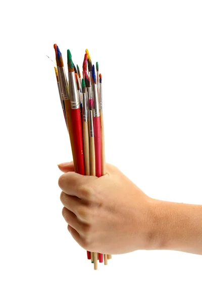 Hand with brushes isolated on white — Stock Photo, Image