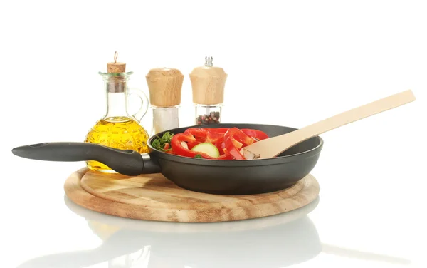 Frying pan with vegetables on white — Stock Photo, Image