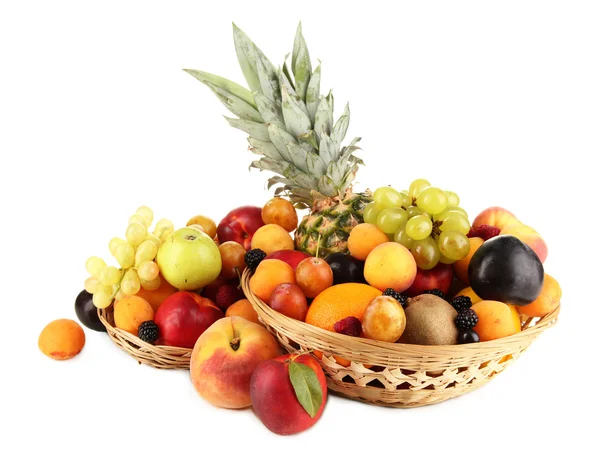 Still life of fruit in basket isolated on white — Stock Photo, Image
