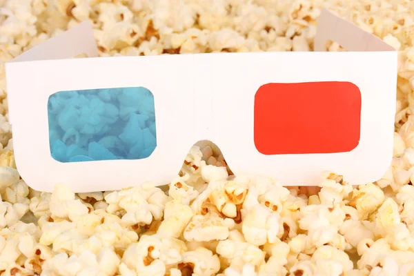 Kino okulary na tle popcorn — Zdjęcie stockowe