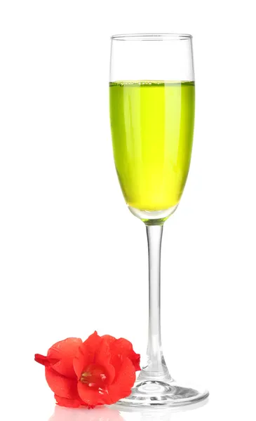 Glass with cocktail and gladiolus bud isolated on white — Stock Photo, Image