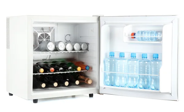 Mini fridge full of bottles of alcoholic beverages and water isolated on wh — Stock Photo, Image