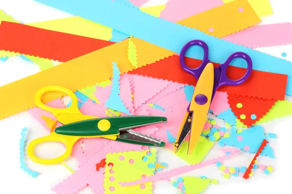 Colorful zigzag scissors with color paper isolated on white — Stock Photo, Image