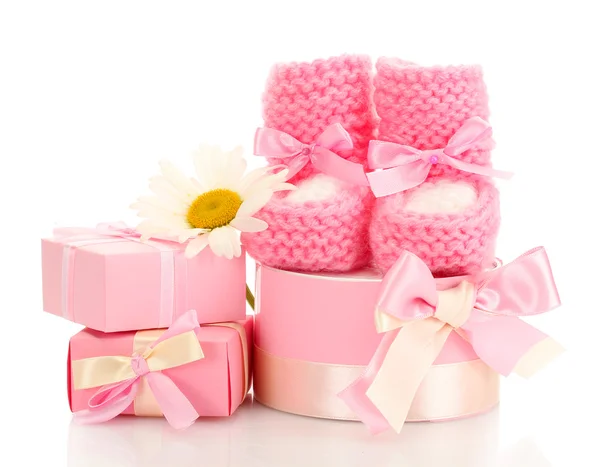 Pink baby boots, gifts and flower isolated on white — Stock Photo, Image