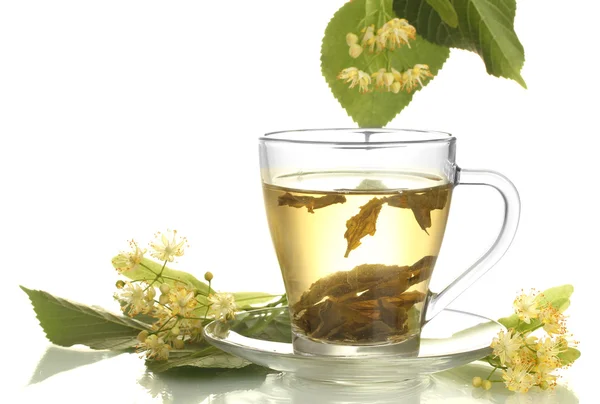 Cup of linden tea and flowers isolated on white — Stock Photo, Image