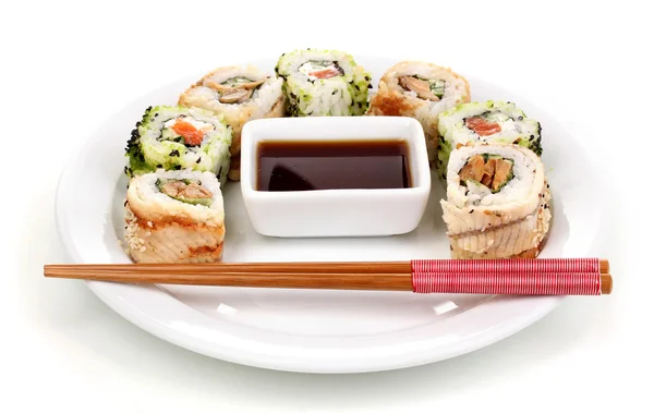 Tasty rolls served on white plate with chopsticks isolated on white — Stock Photo, Image