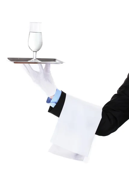 Formal waiter with a glass of water on silver tray isolated on white — Stock Photo, Image