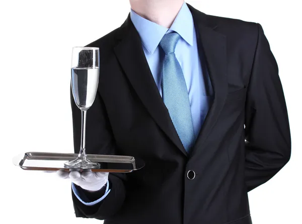 Formeller Kellner mit einem Glas Wasser auf einem silbernen Tablett isoliert auf weiß — Stockfoto
