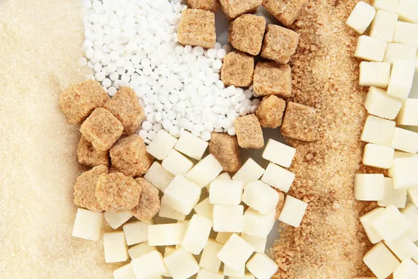 Süßstoff mit weißem und braunem Zucker in Nahaufnahme — Stockfoto