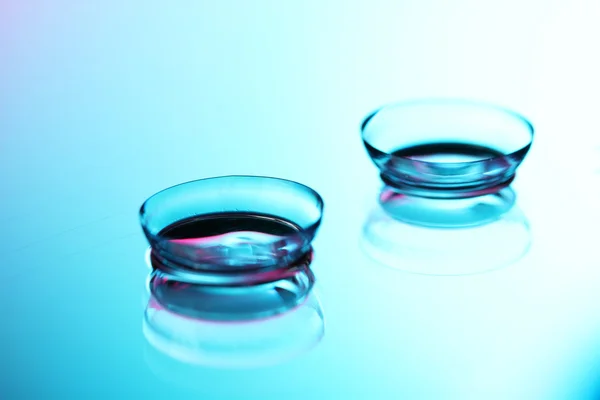 Contact lenses, on blue background — Stock Photo, Image