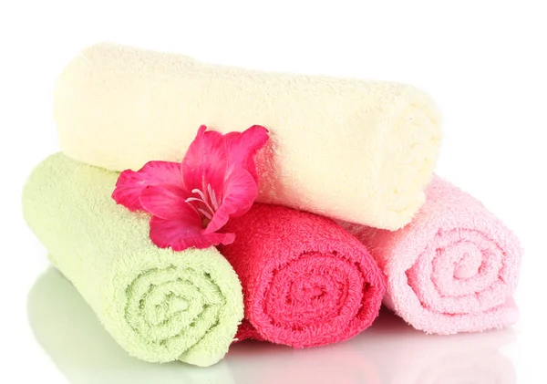 Bright towels and flower isolated on white — Stock Photo, Image