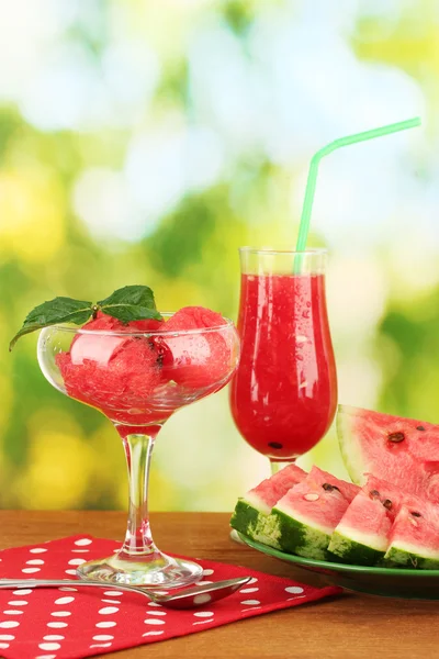 Refreshing desserts of watermelon on green background close-up — Stock Photo, Image